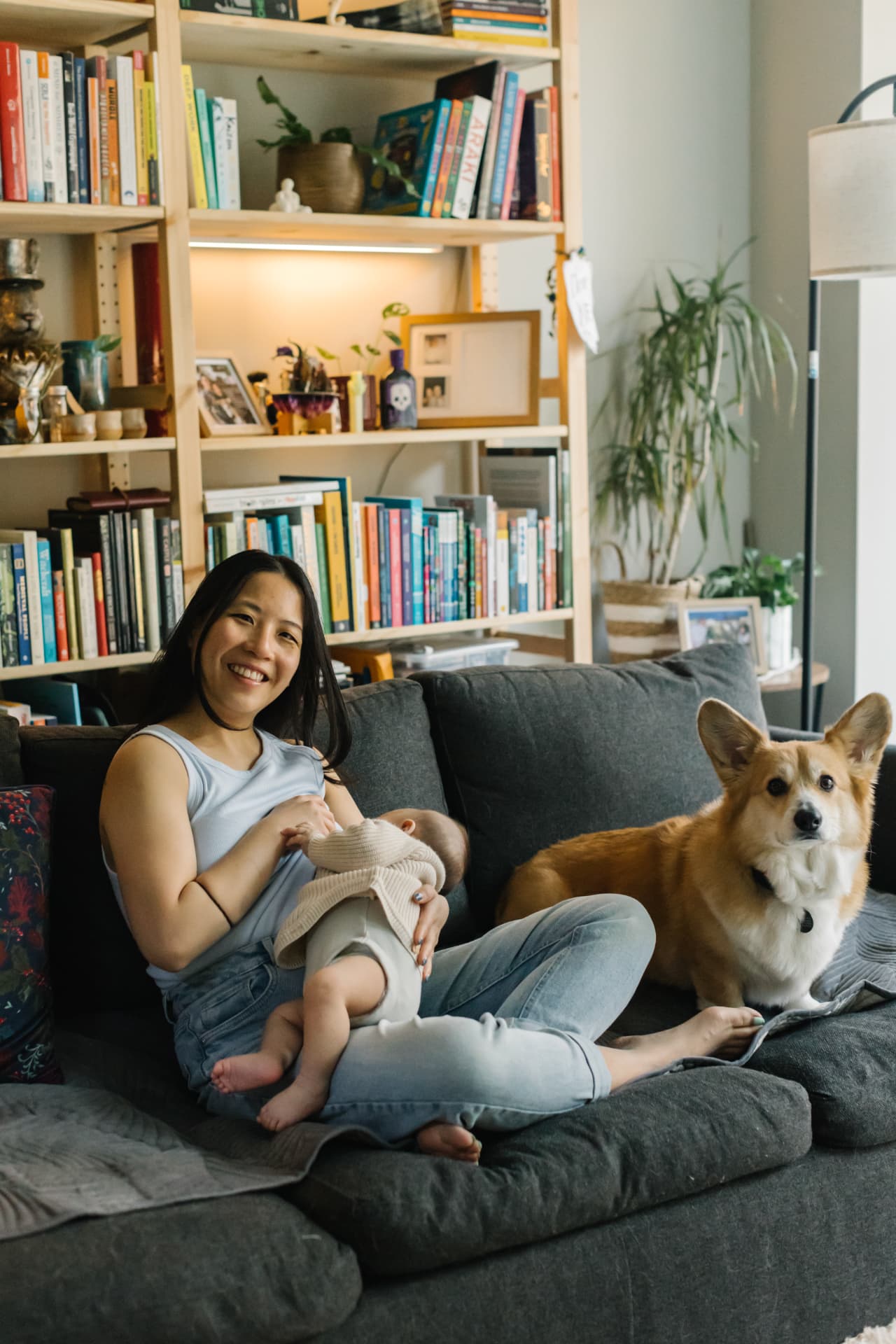 Valerie at home with her baby and dog, envisioning the village behind KindList